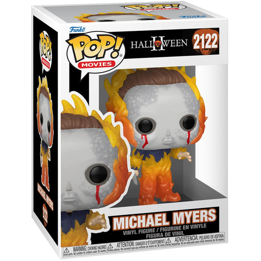 Funko Pop! Movies Michael Myers vinyl figure in its original window box packaging, featuring the character with a gray skull face, brown hair, and orange flames.