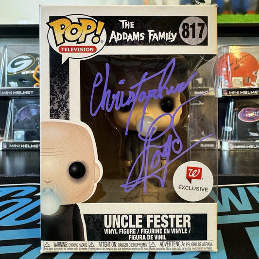 Funko Pop! Television 'The Addams Family' Uncle Fester vinyl figure in its original window box packaging, featuring a purple autograph on the front.