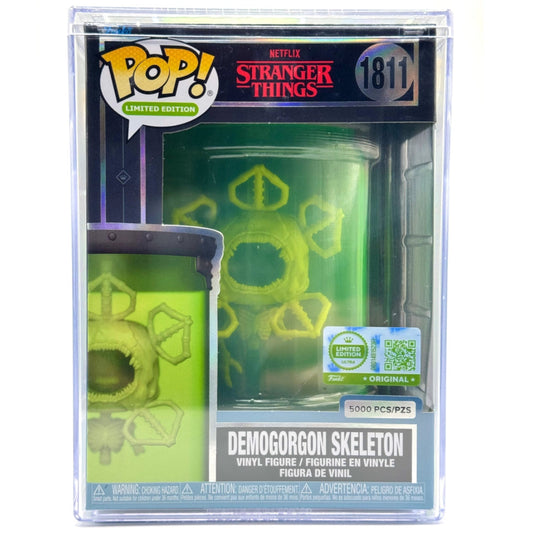 Funko Pop! Stranger Things limited edition Demogorgon Skeleton vinyl figure in its original clear plastic packaging, featuring a green and yellow Demogorgon design.